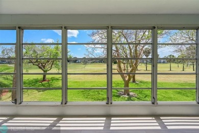 Lake Condo For Sale in Coconut Creek, Florida
