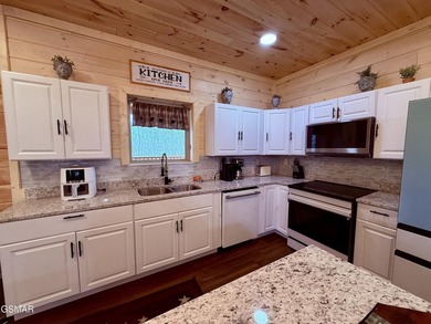This beautifully designed cabin in Sevierville is ideally - photo 12