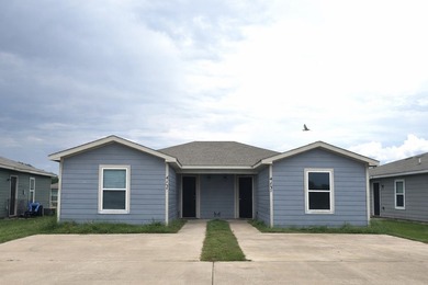 A rare opportunity awaits with this well-maintained full duplex - photo 1