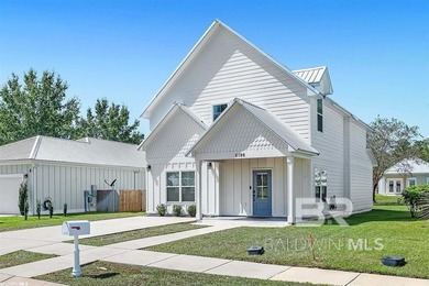 Coastal farmhouse charm meets soaring two-story living in the - photo 1