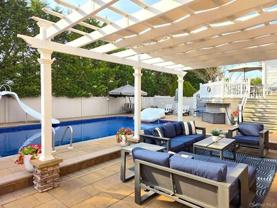 Welcome to 512 Links Drive East in Oceanside. This beautiful - photo 17