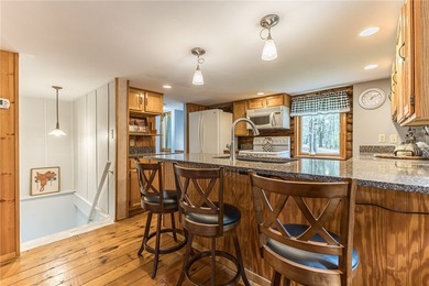 Tucked away on a peaceful private road, this heavenly log home - photo 22