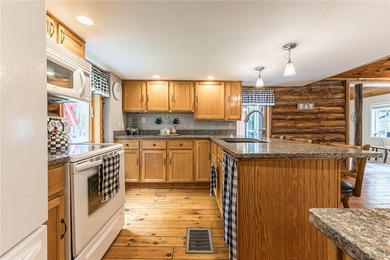 Tucked away on a peaceful private road, this heavenly log home - photo 23
