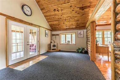 Tucked away on a peaceful private road, this heavenly log home - photo 27