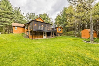 Tucked away on a peaceful private road, this heavenly log home - photo 36