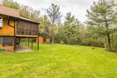 Tucked away on a peaceful private road, this heavenly log home - photo 37