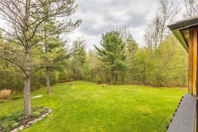 Tucked away on a peaceful private road, this heavenly log home - photo 39