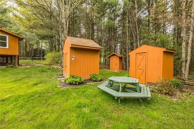 Tucked away on a peaceful private road, this heavenly log home - photo 40