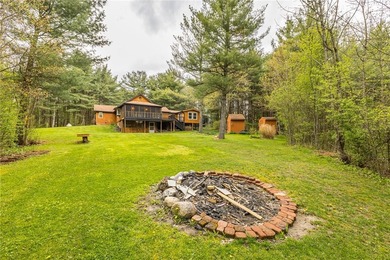 Tucked away on a peaceful private road, this heavenly log home - photo 41