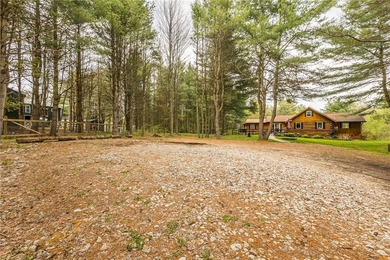 Tucked away on a peaceful private road, this heavenly log home - photo 42