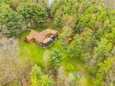 Tucked away on a peaceful private road, this heavenly log home - photo 45