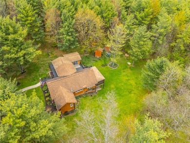 Tucked away on a peaceful private road, this heavenly log home - photo 46