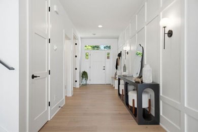 Experience exceptional lakefront living on the highly - photo 8