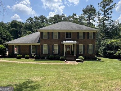 Welcome home to this beautifully updated 4-sided brick home in - photo 1