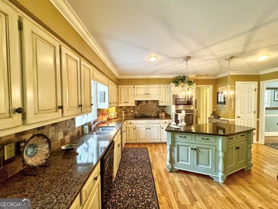 Welcome home to this beautifully updated 4-sided brick home in - photo 3