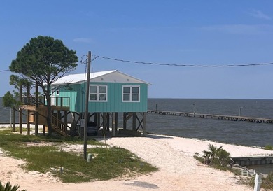 Welcome to this beautifully renovated, raised 2-bedroom, 2-bath - photo 1