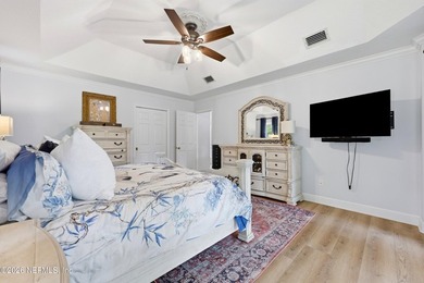 Located in the beautiful, gated waterfront and golf community of - photo 21