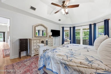 Located in the beautiful, gated waterfront and golf community of - photo 22