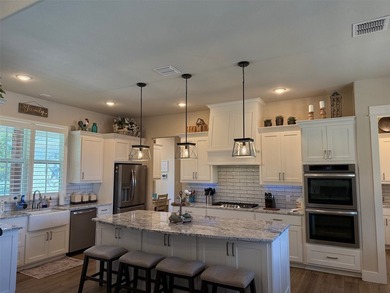 Gated community offers tranquil lake country living with your - photo 4