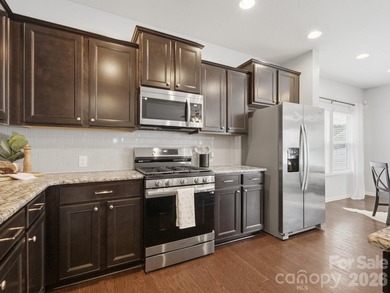 Welcome home to this beautifully appointed home in the highly - photo 7