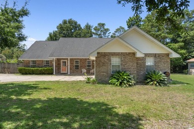 Welcome to Rocky Bayou Estates! This 3-bedroom, 2.5-bathroom - photo 2