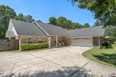 Welcome to Rocky Bayou Estates! This 3-bedroom, 2.5-bathroom - photo 3