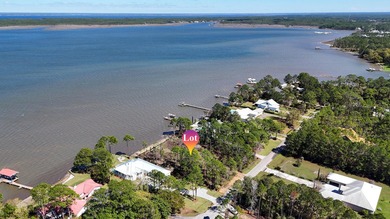 Shovel-Ready Waterfront Estate on Hogtown Bayou with Optional - photo 3