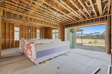 The Darien III by Romair is a custom residence with a detached - photo 7