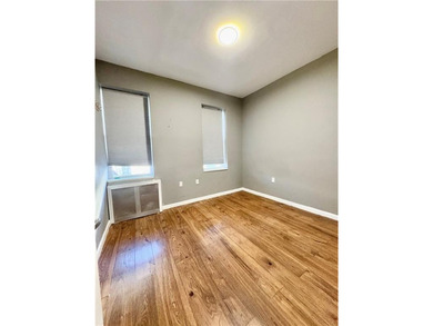 Welcome to this fully renovated 6-family brick property located - photo 6