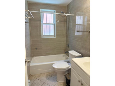 Welcome to this fully renovated 6-family brick property located - photo 8