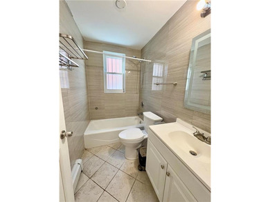 Welcome to this fully renovated 6-family brick property located - photo 9