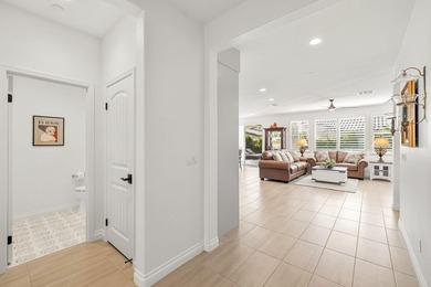 Nestled behind the gates of Floresta, this home stands as one of - photo 11