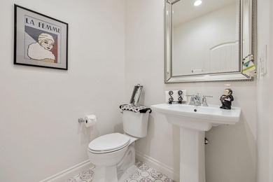 Nestled behind the gates of Floresta, this home stands as one of - photo 12