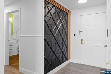 Completely renovated luxury condo offering breathtaking - photo 13
