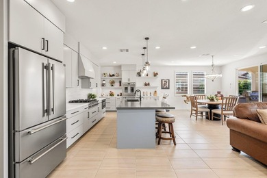 Nestled behind the gates of Floresta, this home stands as one of - photo 14