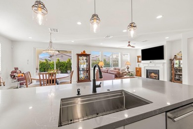 Nestled behind the gates of Floresta, this home stands as one of - photo 17