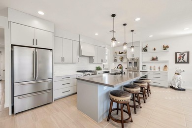 Nestled behind the gates of Floresta, this home stands as one of - photo 19