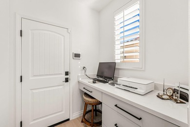 Nestled behind the gates of Floresta, this home stands as one of - photo 27