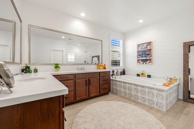 Nestled behind the gates of Floresta, this home stands as one of - photo 33