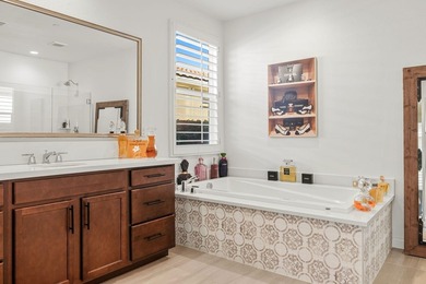 Nestled behind the gates of Floresta, this home stands as one of - photo 34