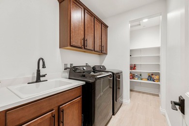 Nestled behind the gates of Floresta, this home stands as one of - photo 45