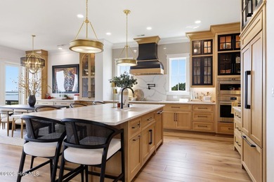 Welcome to an extraordinary soundfront residence in prestigious - photo 11