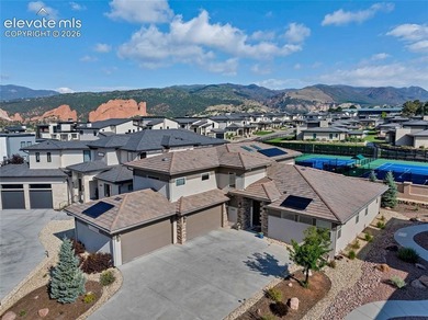 This exceptional residence, tucked behind the private gates of - photo 3