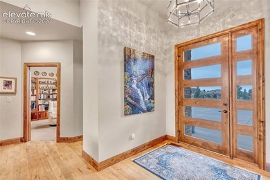 This exceptional residence, tucked behind the private gates of - photo 5