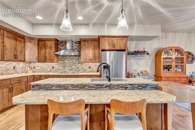 This exceptional residence, tucked behind the private gates of - photo 8