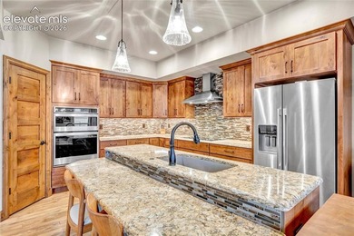 This exceptional residence, tucked behind the private gates of - photo 9