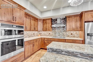 This exceptional residence, tucked behind the private gates of - photo 10