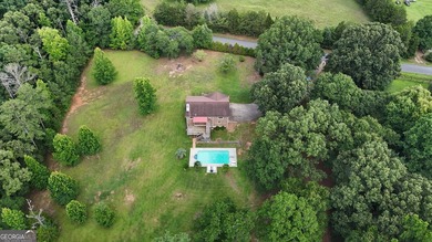 Nestled on 5 private acres with no HOA, this beautifully - photo 34