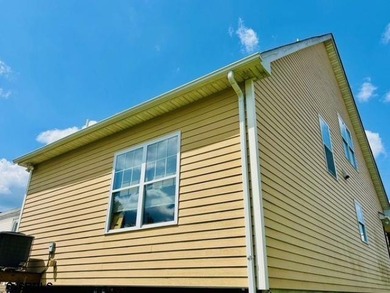 Welcome home with a front porch made for morning coffee or an