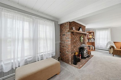 This charming Center Moriches 4/5-bedroom Colonial dates back to - photo 8